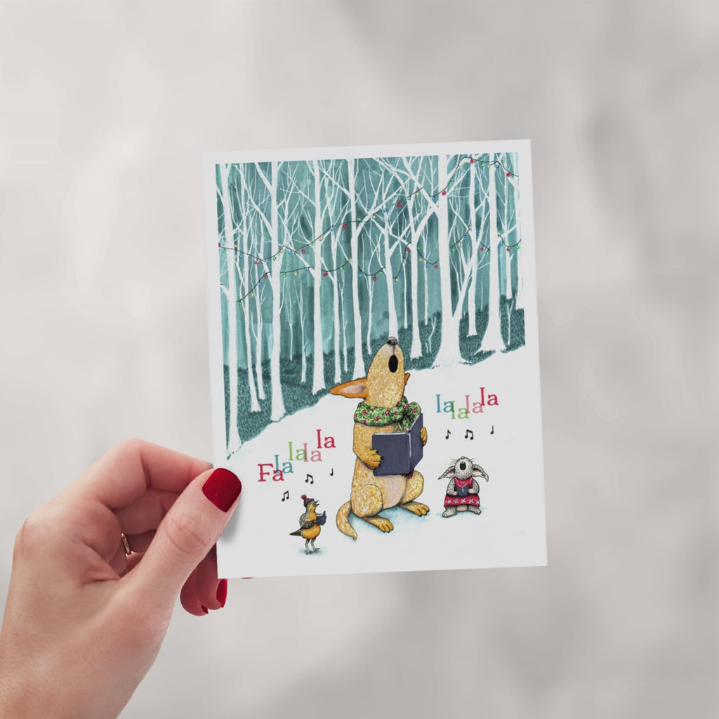Set of eight red heeler Christmas cards featuring Australian Cattle Dogs in festive holiday scenes, from reindeer costumes and Christmas lights to snowy winter adventures.